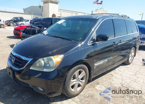 2009 Honda Odyssey Touring from USA, damaged, VIN 5FNRL389X9B037638